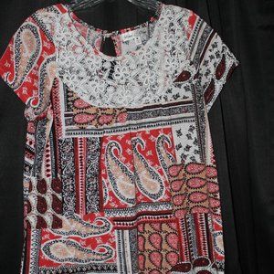 Stem & Vine Ladies Lightweight Top. Black, white and orange paisley. Size Medium